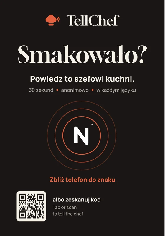 Ciemny stojak z napisem Smakowało? i znakiem NFC